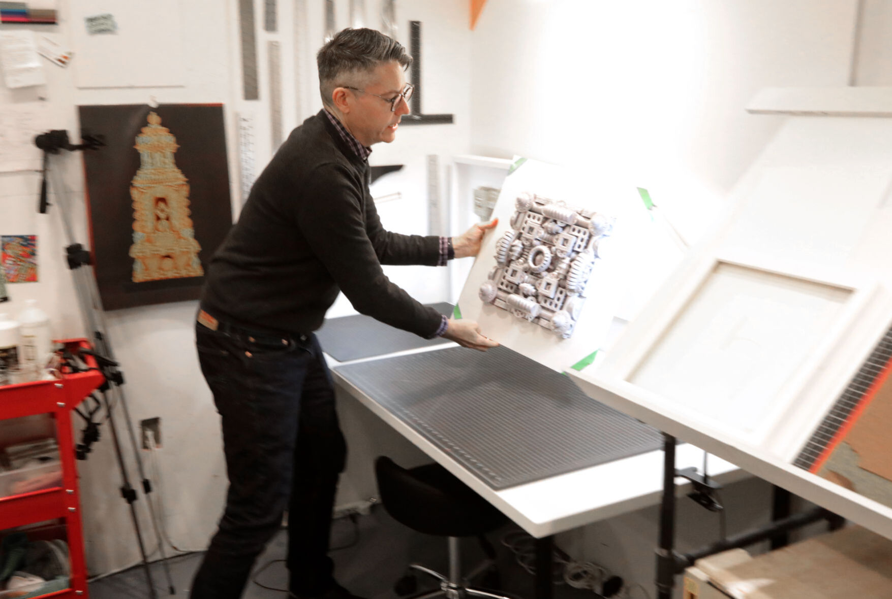 Michael Velliquette with work in metallic paper